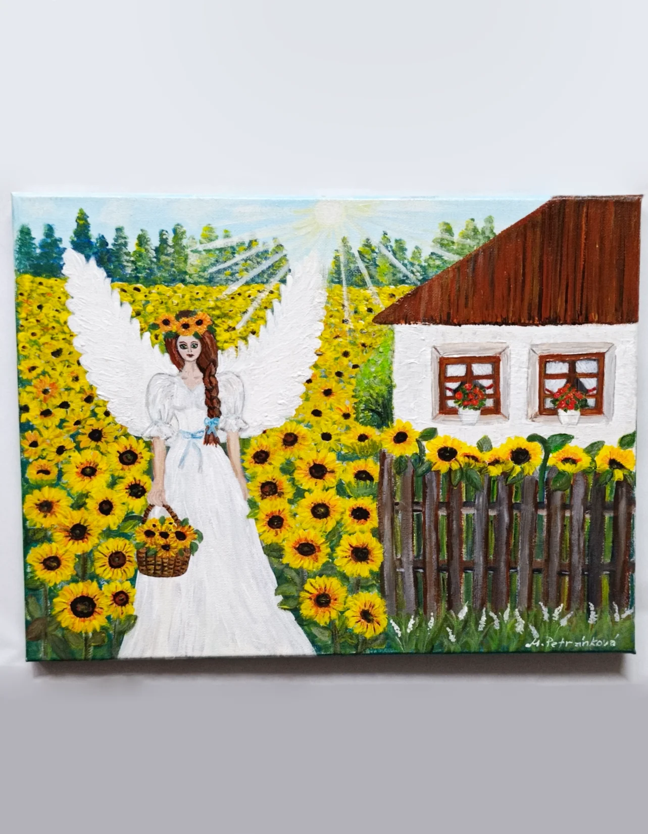 Andělka ve slunečnicovém objetí